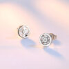 Aretes Rueda   Blanco/Plateados