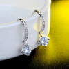 Aretes Solitarios   Blanco/Plateados
